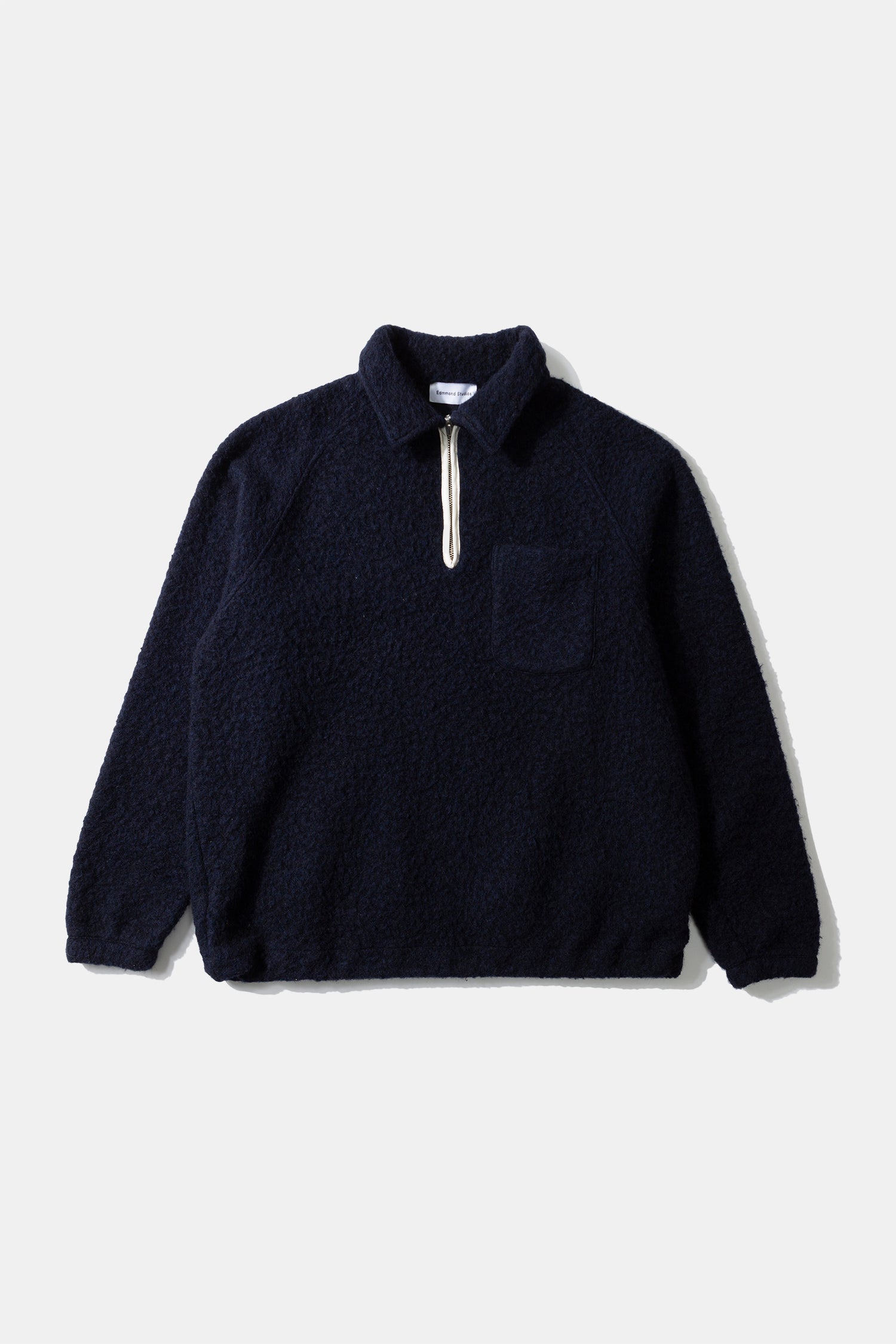 UNCONVETIONAL ZIP POLO NAVY